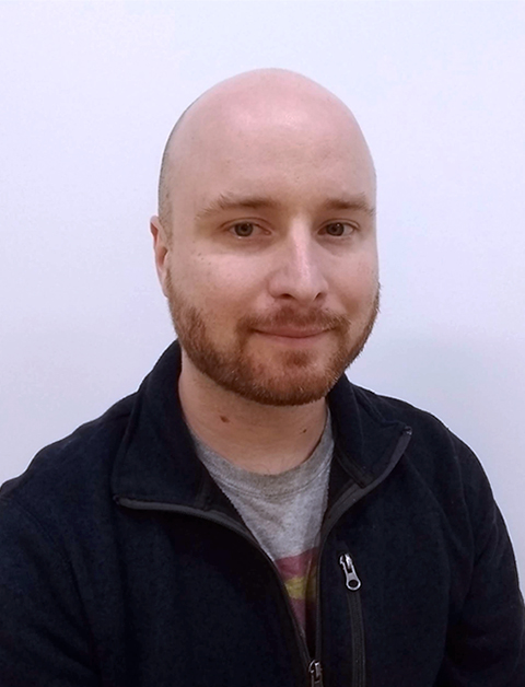 Headshot photograph of graphic design professor Matthew Hoelscher.