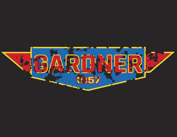 Graphic of a distressed old teeshirt design with the town name "Gardner" and the founding date below "1857" in yellow, red, and blue colors.